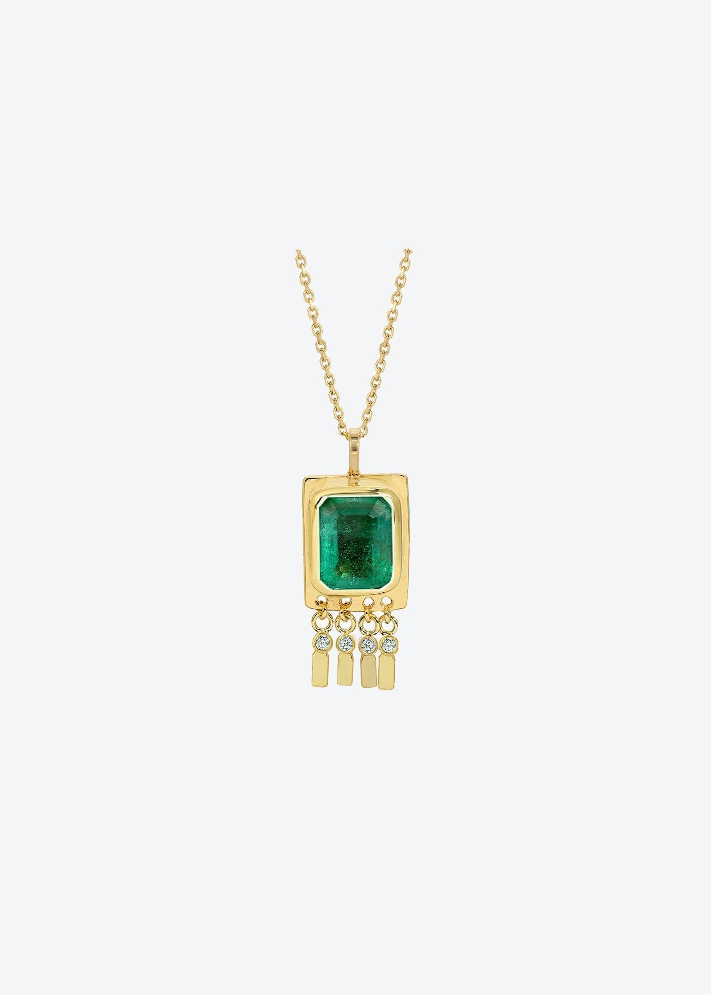 Gold charm pendant necklace with emerald centerpiece and dangling gold diamond accents