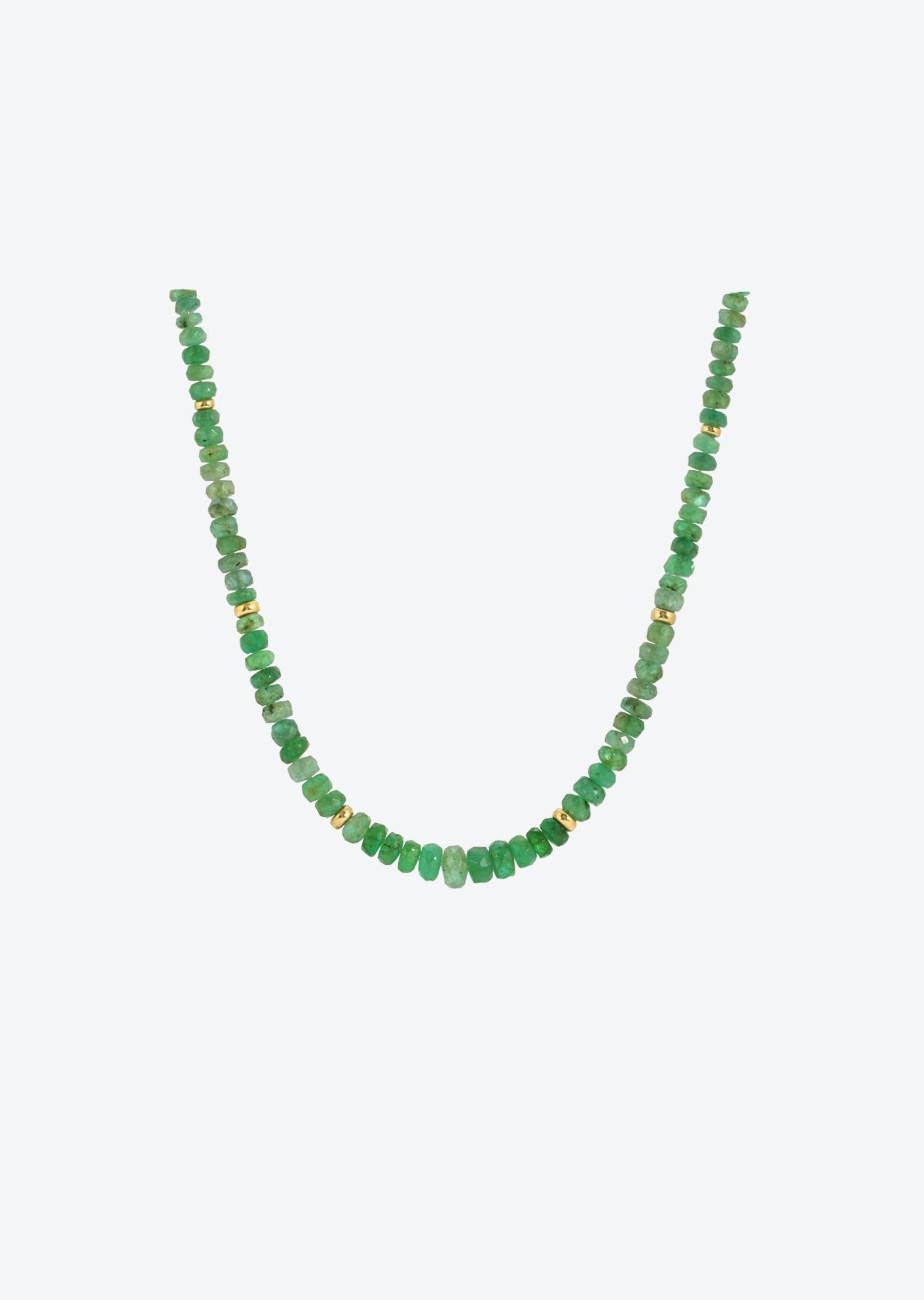 Emerald beaded choker with gold details, showcasing vibrant green gemstones in a lightweight and versatile design.
