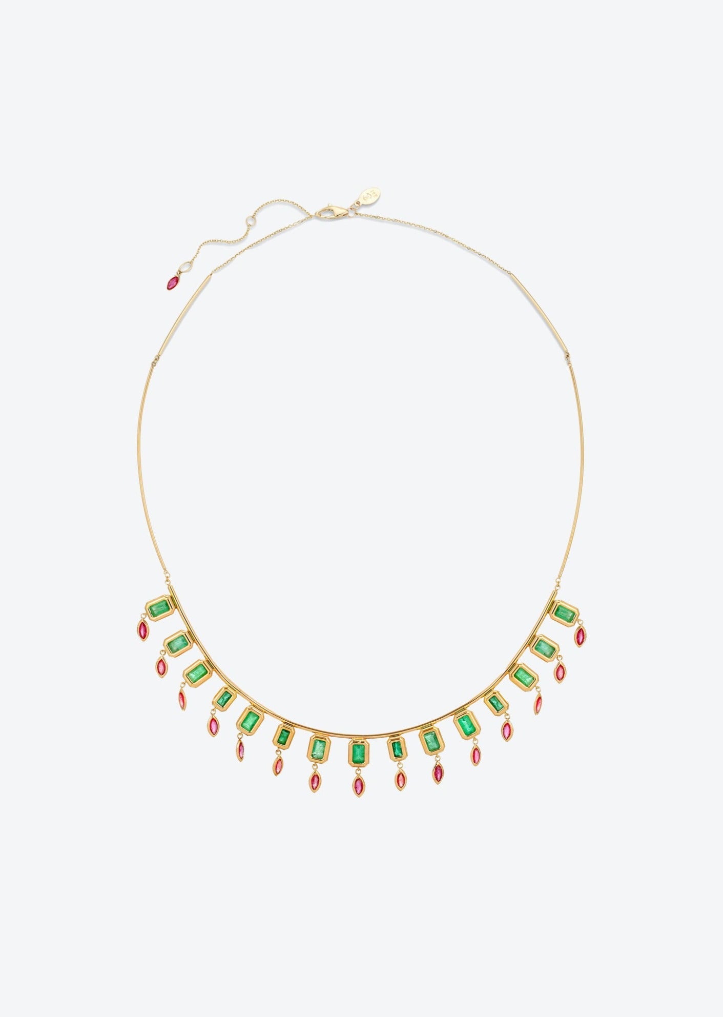 Handcrafted statement necklace with cascading gemstones in vibrant green and deep red hues