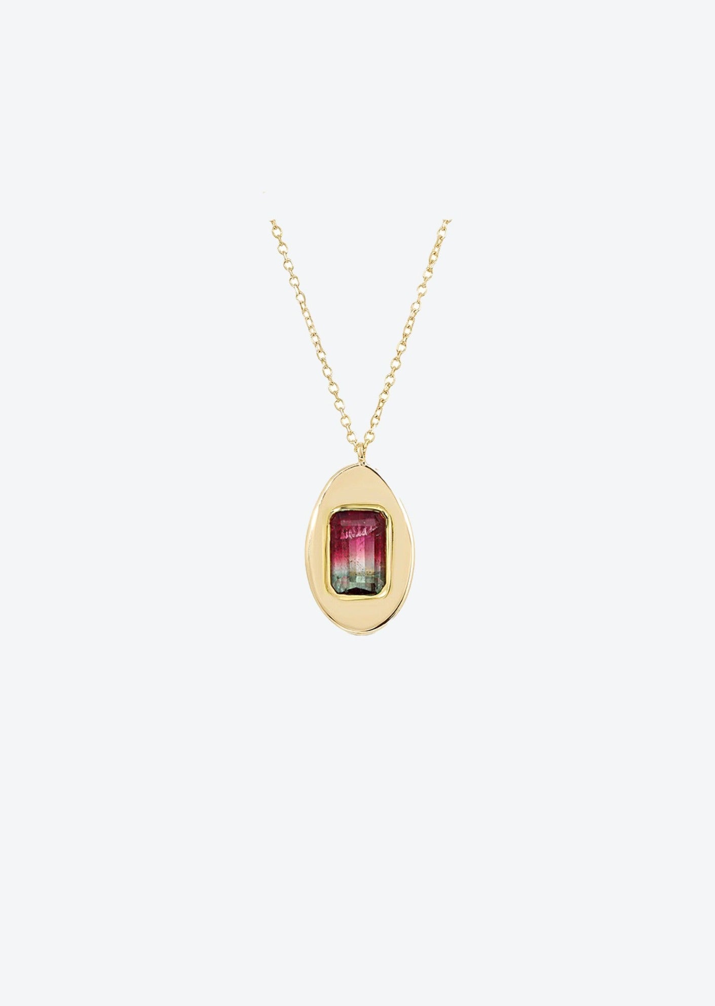 Handcrafted watermelon tourmaline pendant necklace charm in solid gold offering bi-color brilliance and minimalist elegance.