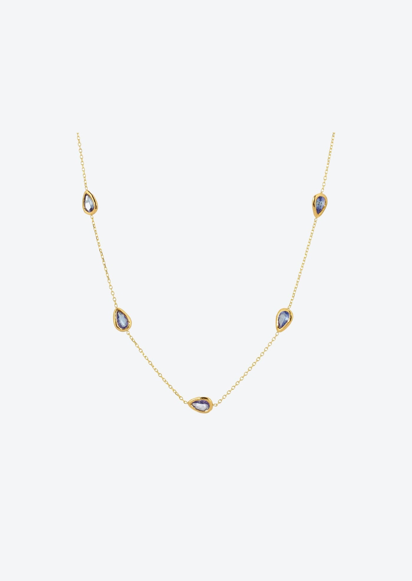 Purple drop necklace featuring tanzanite gemstones in bezel settings