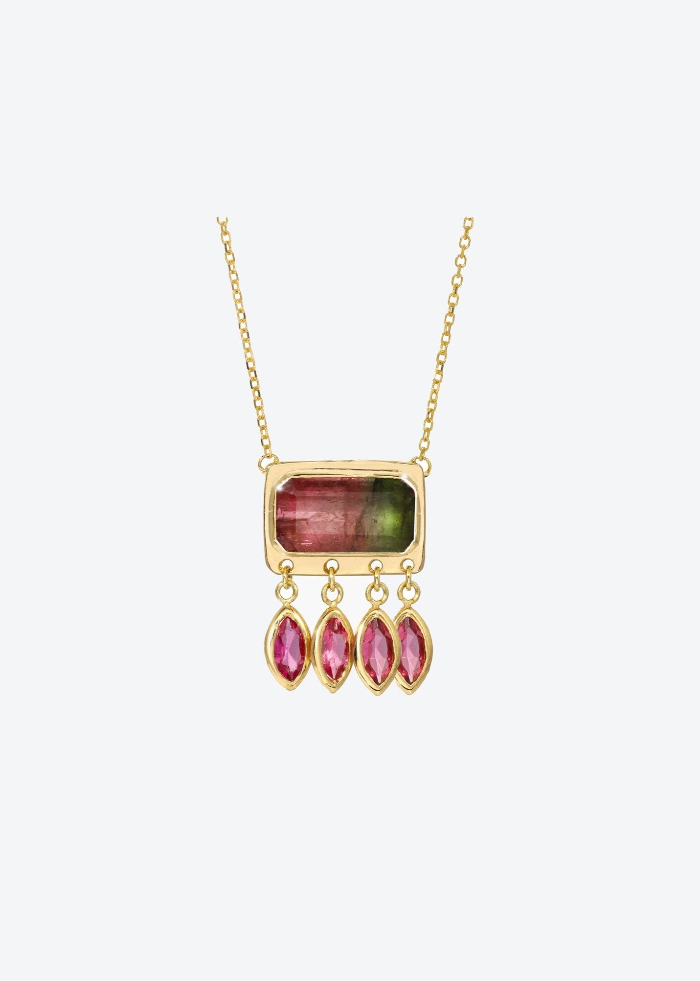 Watermelon tourmaline and ruby pendant charm necklace featuring a bicolor gemstone bezel-set in solid 14K yellow gold on a dainty necklace chain
