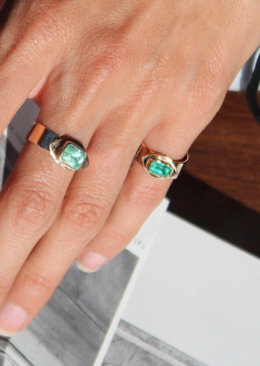 Chunky emerald gold pinky ring inspired by ancient the evil eye protective motifs