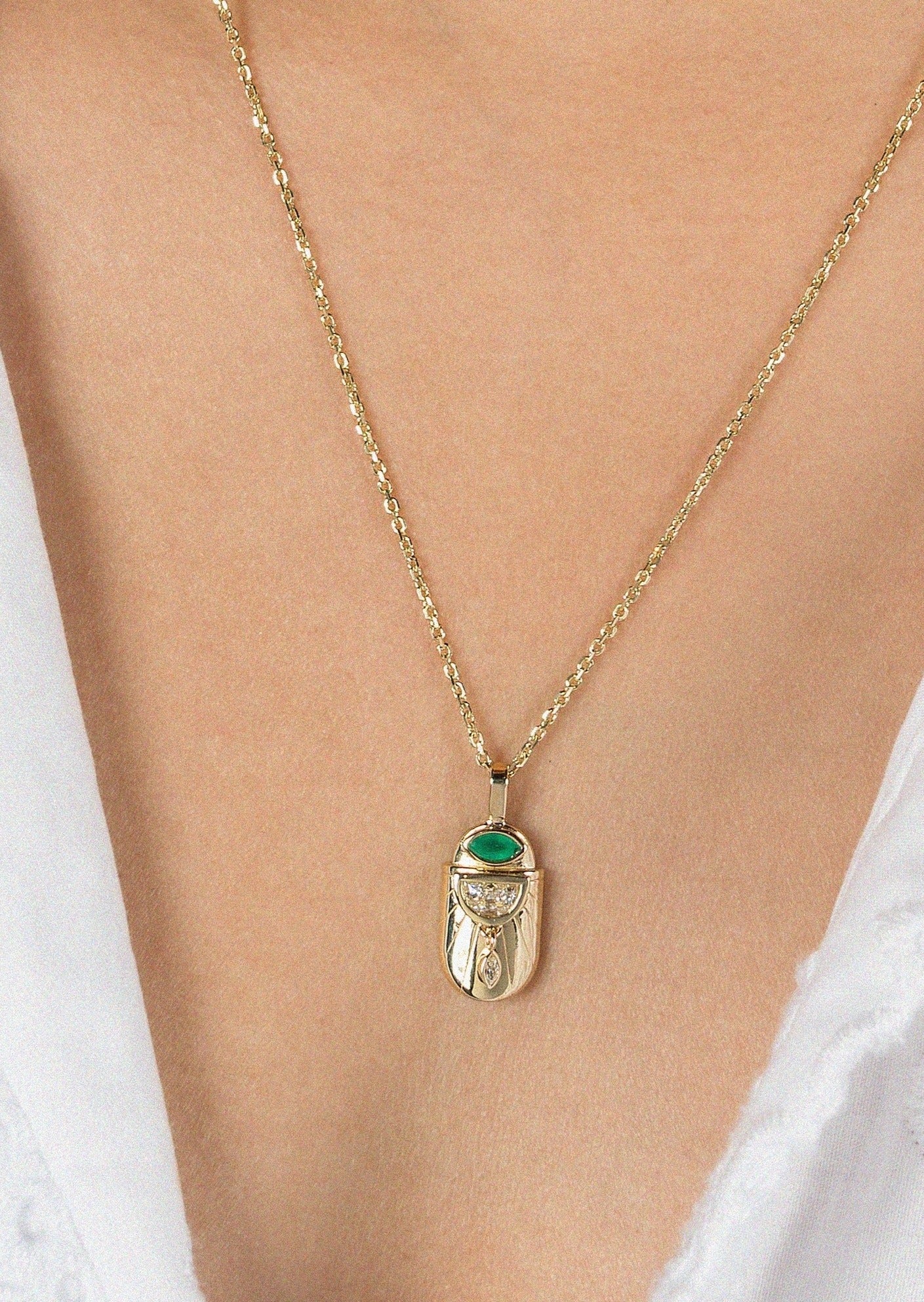 Emerald scarab necklace with marquise-cut emerald and diamonds in 14K solid gold"

