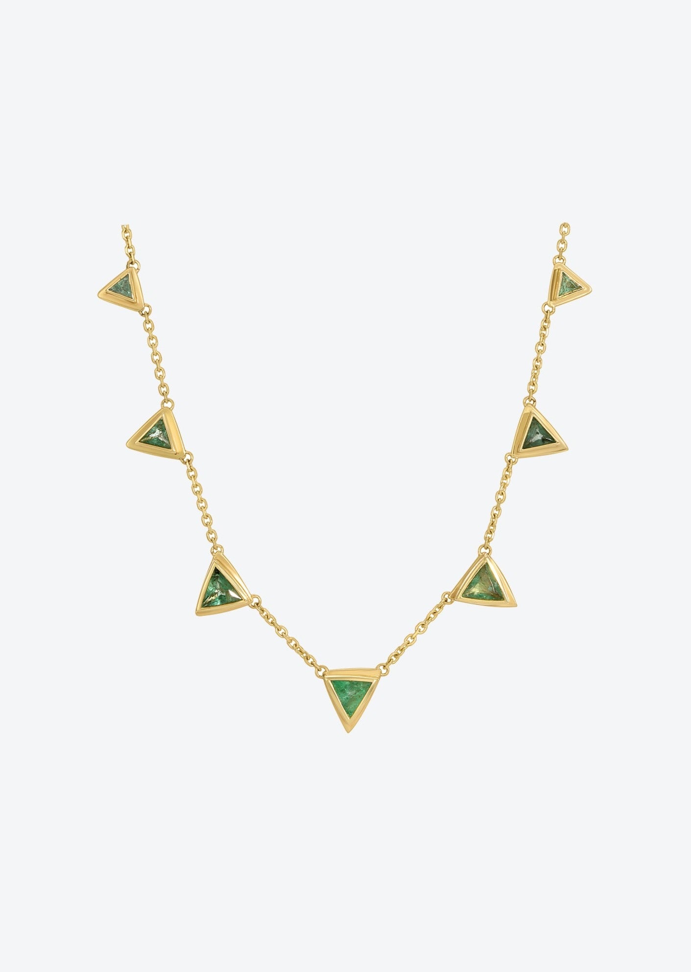 Minimalist emerald station necklace crafted in solid 14K yellow gold, designed with geometric bezels and dainty chain links.