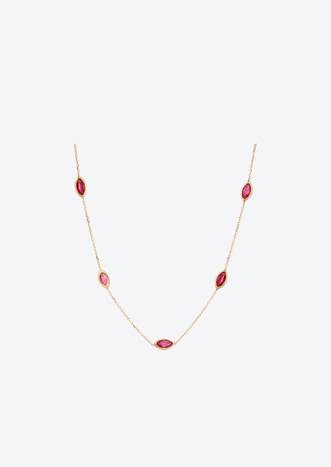 Handcrafted gemstone necklace featuring marquise cut rubies and gold chain