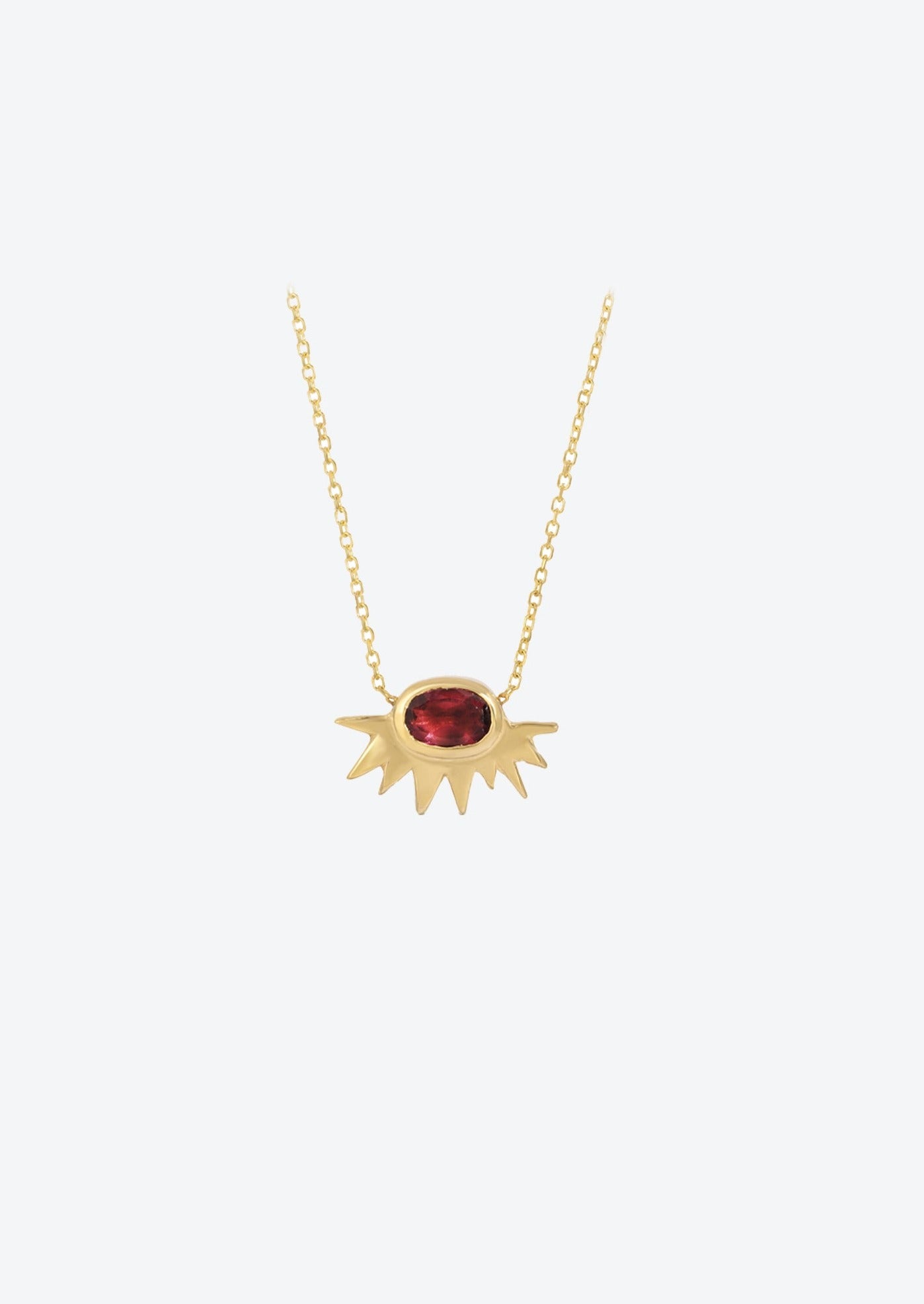 Gold sunshine necklace pendant with oval rubellite on delicate cable chain