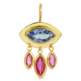 eye shaped pendant with light blue stone and rubies