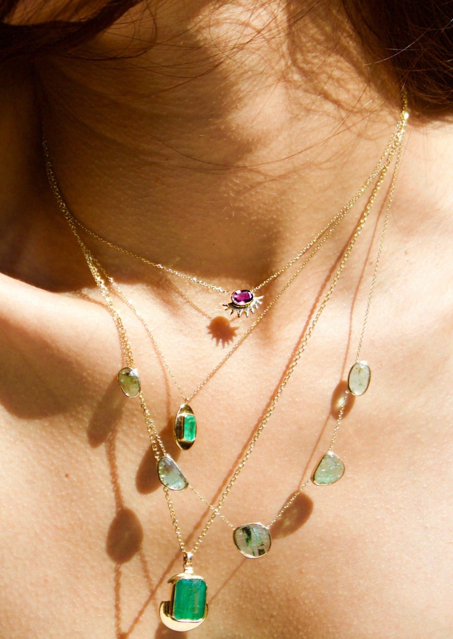 Ancient-inspired sun jewelry with pink rubellite tourmaline on adjustable gold chain